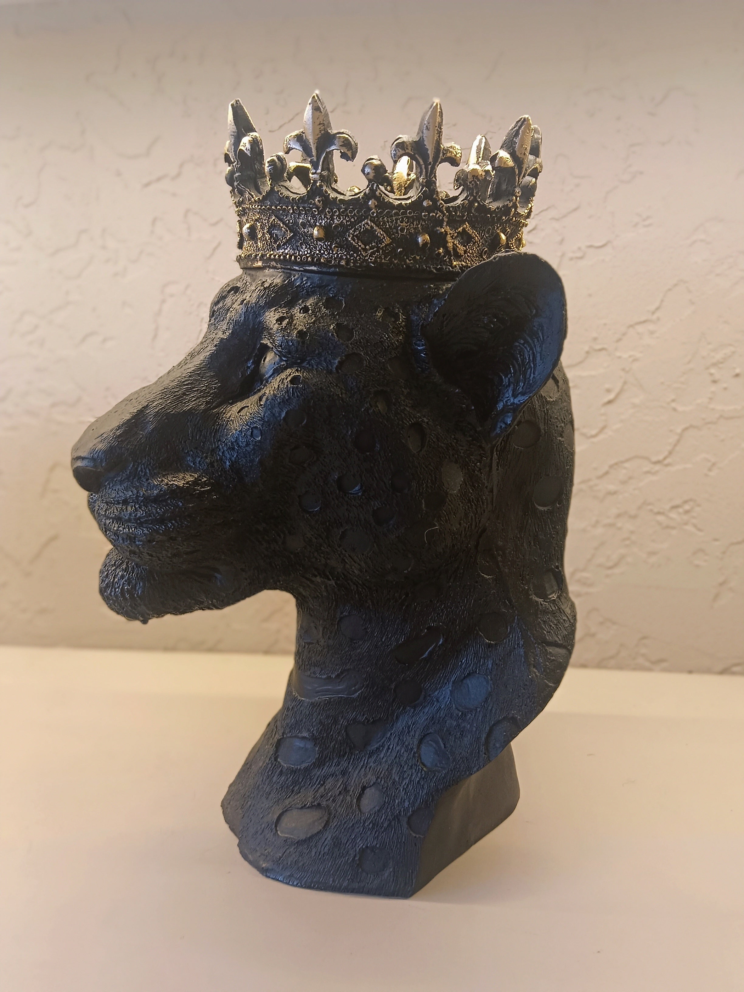 A Majestic Decorative Leopard Bust Sculpture Crowned With An Ornate Golden Crown
