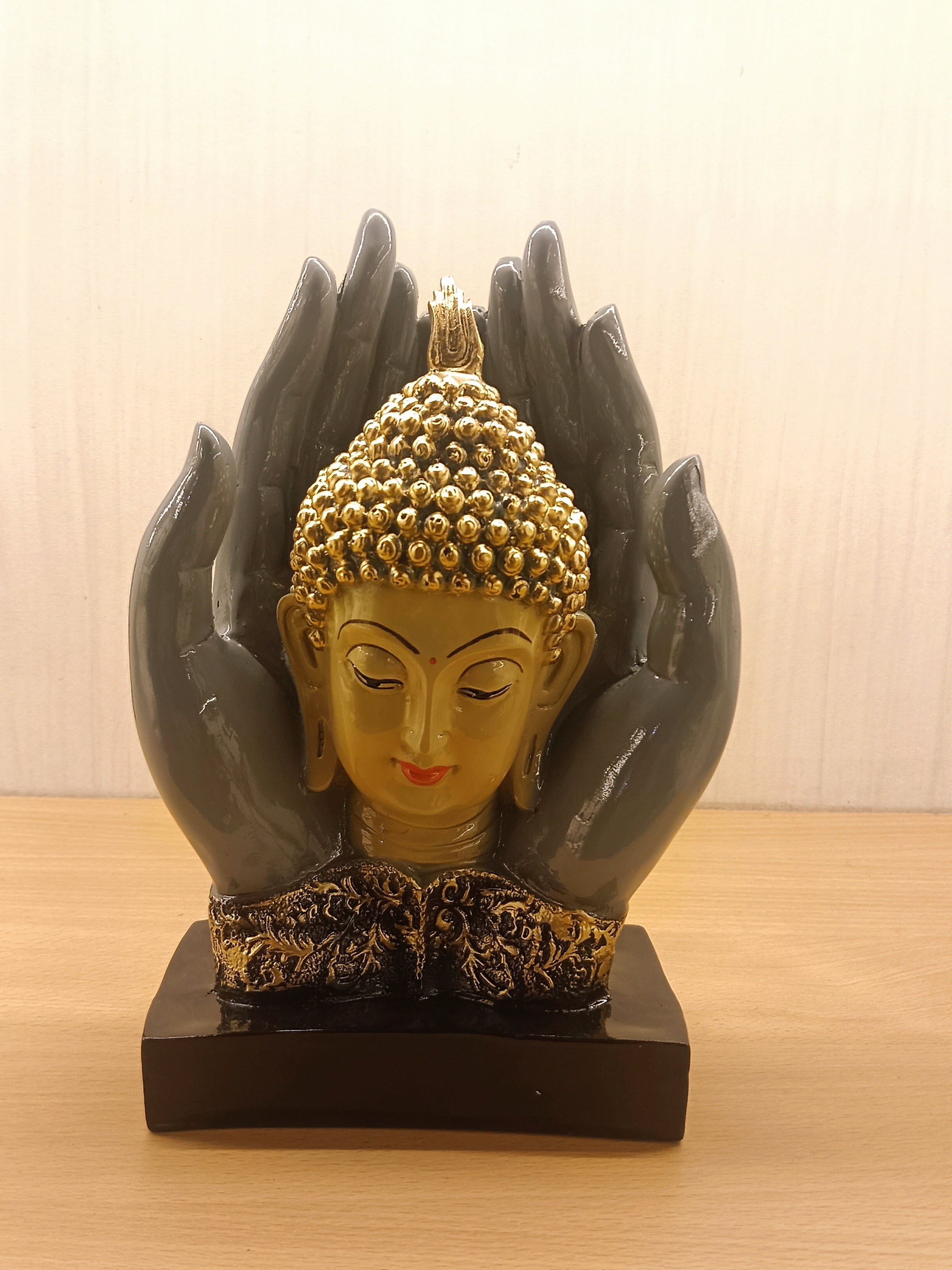 This Elegant Buddha Head Statue Is Designed Within Protective Hands, Symbolizing Peace, Divine Blessings