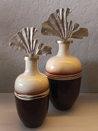A PAIR OF ELEGANT DECORATIVE METAL VASES FEATURING A GLOSSY TWO-TONE FINISH