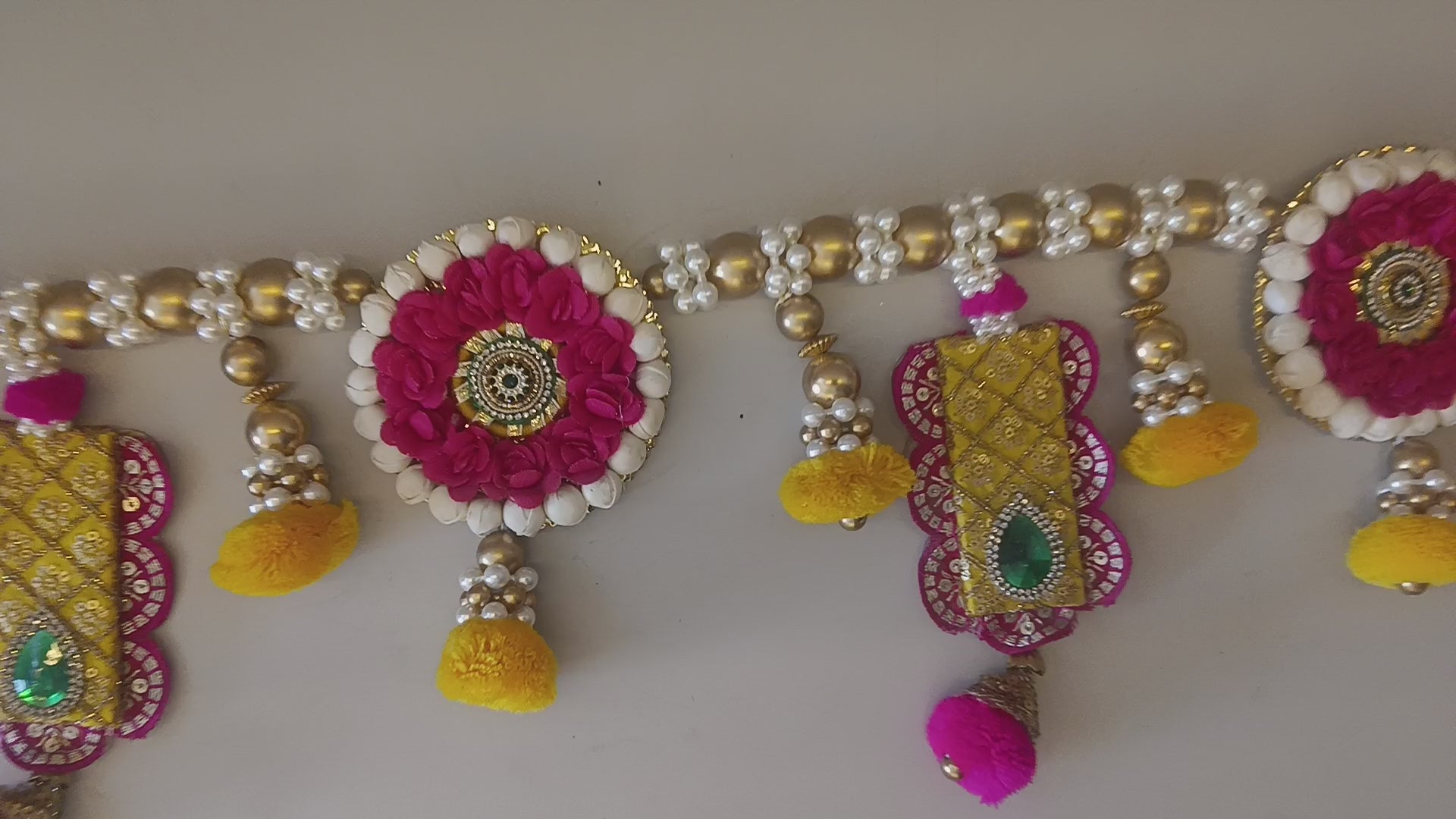 Vibrant Decorative Bandhanwar Is Crafted With Colorful Beads, Pom-Poms, And Traditional Motifs